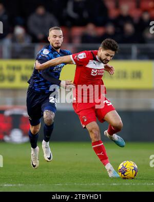 Derby County's Joe Ward (left) challenges Leyton Orient’s Rob Hunt (right) during the Sky Bet League One match at Brisbane Road, London. Picture date: Saturday December 9, 2023. Stock Photo