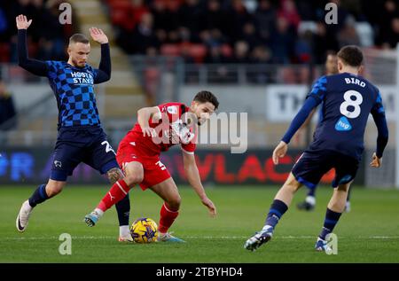 Derby County's Joe Ward (left) challenges Leyton Orient’s Rob Hunt (right) during the Sky Bet League One match at Brisbane Road, London. Picture date: Saturday December 9, 2023. Stock Photo