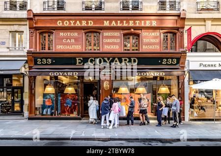 People lining up to enter Maison Goyard a luxury leather goods shop on rue Saint Honoré ,Paris, France Stock Photo