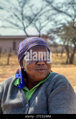 portrait of happy overweight village old african woman , Botswana rural area Stock Photo