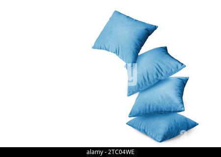 Stack of blue pillows isolated on white background. Pile of  decorative cushions for sleeping and resting, home interior, house decor. Stock Photo