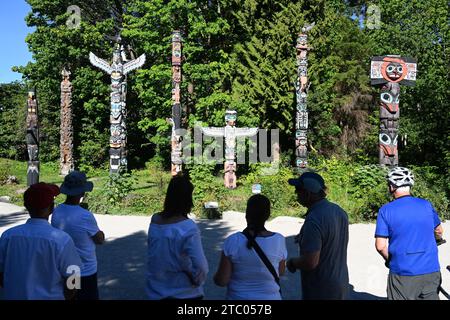 Vancouver, BC, Canada - August 16, 2023: Totem poles in Stanley Park Vancouver. Stock Photo