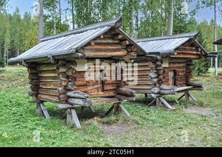 Two old wooden barns in the Russian national style. Arkhangelsk. Russia Stock Photo