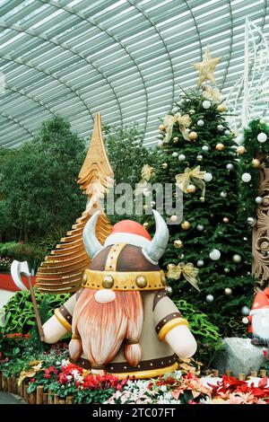 A Viking figure holding a sword among festive decorations in the background, Gardens by the Bay, Singapore Stock Photo