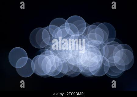 Abstract Circular Backoh Background of ChristmasLight on Black Background. Stock Photo