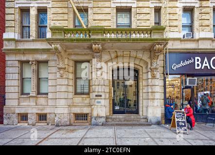 George F. Pelham designed neo-Renaissance 50 E 96th Street, Woodward Hall. The brick-and-stone building is in the Carnegie Hill Historic District. Stock Photo