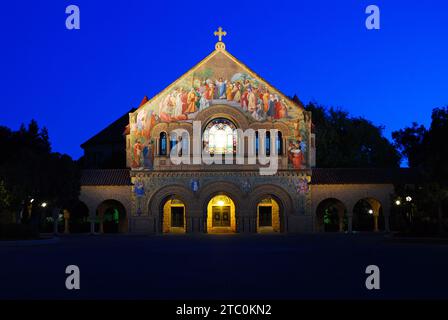 The Memorial Chapel is illuminated on the campus of Stanford University in Palo Alto, California Stock Photo