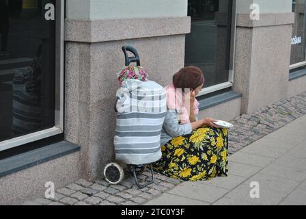 Female panhandler in Riga, Latvia Stock Photo