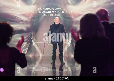 Berlin, Germany. 09th Dec, 2023. Bela Tarr, director, receives the 'Honorary Award of the Academy President and Board' at the European Film Awards in the Arena Berlin. The film prize has been awarded by the European Film Academy (EFA) since 1988. Credit: Annette Riedl/dpa/Alamy Live News Stock Photo