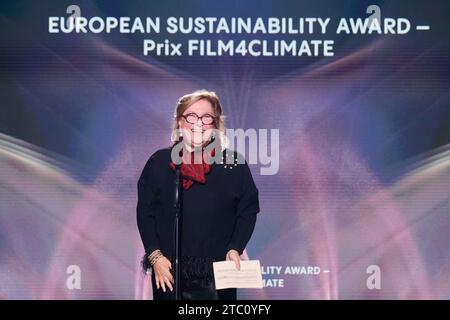 Berlin, Germany. 09th Dec, 2023. Güler Sabanc·, entrepreneur, receives her award in the 'European Sustainability Award - Prix Film4climate' category at the European Film Awards ceremony. The European Film Academy (EFA) presents the awards at a gala in the Arena Berlin. Credit: Annette Riedl/dpa/Alamy Live News Stock Photo