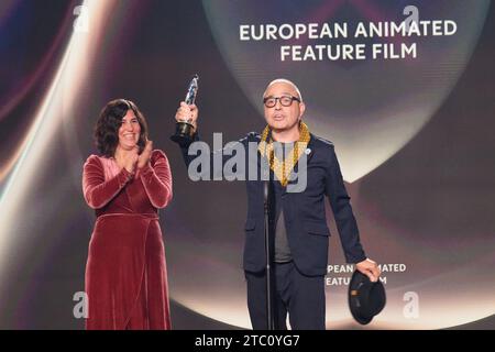 Berlin, Germany. 09th Dec, 2023. Pablo Berger, director, receives his award in the 'European Animated Feature Film' category for the film 'Robot Dreams' at the European Film Awards ceremony. The European Film Academy (EFA) presents the awards at a gala in the Arena Berlin. Credit: Annette Riedl/dpa/Alamy Live News Stock Photo