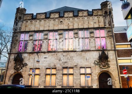 the colorfully illuminated historic Guerzenich festival hall from the 15th century in cologne's old town Stock Photo