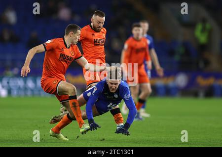 Cardiff, UK. 09th Dec, 2023. Josh Bowler of Cardiff City is fouled. EFL Skybet championship match, Cardiff city v Millwall at the Cardiff City Stadium in Cardiff, Wales on Saturday 9th December 2023. this image may only be used for Editorial purposes. Editorial use only, pic by Andrew Orchard/Andrew Orchard sports photography/Alamy Live news Credit: Andrew Orchard sports photography/Alamy Live News Stock Photo