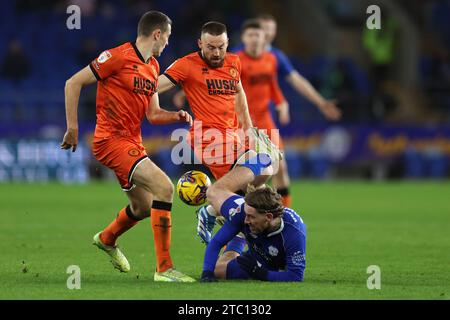 Cardiff, UK. 09th Dec, 2023. Josh Bowler of Cardiff City is fouled. EFL Skybet championship match, Cardiff city v Millwall at the Cardiff City Stadium in Cardiff, Wales on Saturday 9th December 2023. this image may only be used for Editorial purposes. Editorial use only, pic by Andrew Orchard/Andrew Orchard sports photography/Alamy Live news Credit: Andrew Orchard sports photography/Alamy Live News Stock Photo