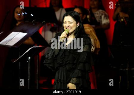 December 10, 2023, Mexico City, Ciudad de Mexico, Mexico: December 9, 2023, Mexico City, Mexico: Chilean singer-songwriter, Mon Laferte accompanied by the Viento Florido Regional Women's Philharmonic Band in concert at the Palace of the fine arts in Mexico City. on December 9, 2023 in Mexico City, Mexico (Credit Image: © Luis Barron/eyepix via ZUMA Press Wire) EDITORIAL USAGE ONLY! Not for Commercial USAGE! Stock Photo