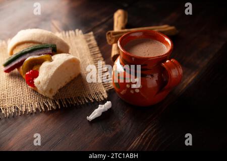 Traditional Kings day cake also called Rosca de Reyes, roscon, Epiphany Cake and with a clay Jarrito. Mexican tradition on January 5th Stock Photo