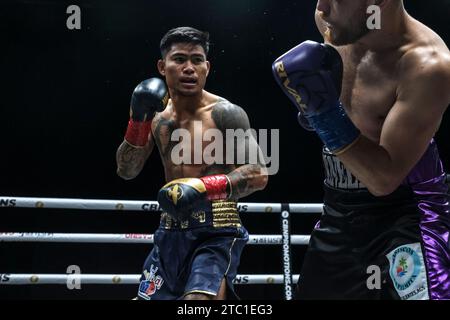 Long Beach, California, USA. 9th Dec, 2023. Action between former featherweight champion Mark Magsayo (25-2 navy & gold) enters the and Isaac Avelar (17-7). Magasayo won the contest by knockout in the 3rd round. (Credit Image: © Adam DelGiudice/ZUMA Press Wire) EDITORIAL USAGE ONLY! Not for Commercial USAGE! Credit: ZUMA Press, Inc./Alamy Live News Stock Photo