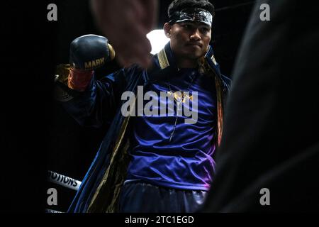 Long Beach, California, USA. 9th Dec, 2023. Former featherweight champion Mark Magsayo (25-2) enters the ring to make his super featherweight debut against Isaac Avelar (17-7) whom he would beat by 3rd round knockout. (Credit Image: © Adam DelGiudice/ZUMA Press Wire) EDITORIAL USAGE ONLY! Not for Commercial USAGE! Credit: ZUMA Press, Inc./Alamy Live News Stock Photo