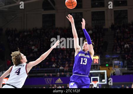 Seattle, WA, USA. 09th Dec, 2023. Washington Huskies forward Moses Wood (13) shoots form the perimeter during the NCAA basketball game between the Gonzaga Bulldogs and Washington Huskies at Hec Edmundson Pavilion in Seattle, WA. Washington defeated Gonzaga 78-73. Steve Faber/CSM/Alamy Live News Stock Photo