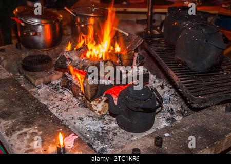 Saariselka, Finland - November 29, 2010: Fireplace in a Sami 'kota' used to host a dinner event for tourists. Stock Photo