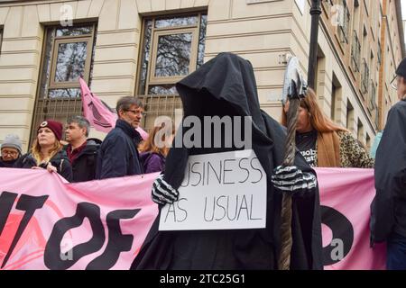 London, UK. 9th December 2023. Climate activists gathered outside BP headquarters in Central London in protest against oil companies taking over COP28, and calling for climate justice. Credit: Vuk Valcic/Alamy Live News Stock Photo