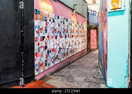 Love Lane, an alley with murals and ceramic tiles with quotes about love, in Crampton Court, Temple Bar district, Dublin city center, Ireland Stock Photo
