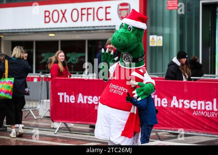 London, UK. 10th Dec, 2023.  Fan with gunnersauras during the Arsenal Women FC v Chelsea Women FC WSL match at the Emirates Stadium, London, England, United Kingdom on 10 December 2023 Credit: Every Second Media/Alamy Live News Stock Photo