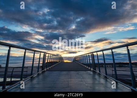 The footbridge over to east beach at sunrise. Lossiemouth, Morayshire, Scotland Stock Photo