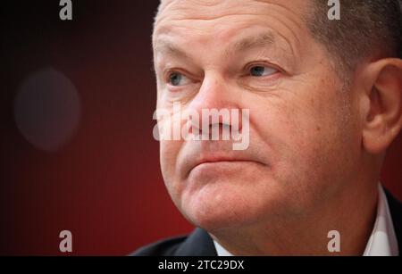 Berlin, Germany. 10th Dec, 2023. Federal Chancellor Olaf Scholz (SPD) sits at the SPD's regular federal party conference at the Berlin Exhibition Center. Chancellor Scholz (SPD), Vice Chancellor Habeck (Greens) and Finance Minister Lindner (FDP) have been wrestling for days over how to plug a 17 billion euro hole in the budget for 2024. Negotiations are set to continue this evening. Credit: Bernd von Jutrczenka/dpa/Alamy Live News Stock Photo