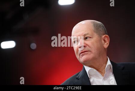 Berlin, Germany. 10th Dec, 2023. Federal Chancellor Olaf Scholz (SPD) sits at the SPD's regular federal party conference at the Berlin Exhibition Center. Chancellor Scholz (SPD), Vice Chancellor Habeck (Greens) and Finance Minister Lindner (FDP) have been wrestling for days over how to plug a 17 billion euro hole in the budget for 2024. Negotiations are set to continue this evening. Credit: Bernd von Jutrczenka/dpa/Alamy Live News Stock Photo