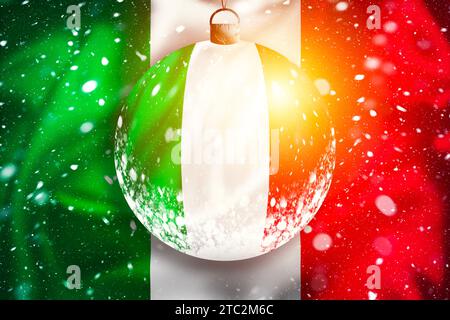 Italy flag snow view through glass Christmas ball with light effect, xmas season illustration, Rome, Italy Stock Photo
