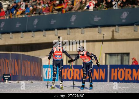 Beatrice Trabucchi of Italy hands over to teammate Rebecca Passler