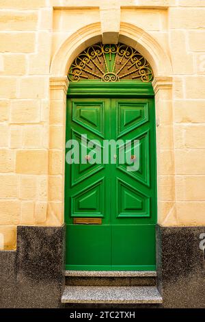 The Typical elegant green door in Maltese villages Stock Photo