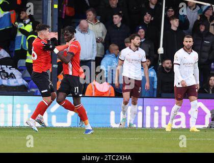 Luton, UK. 10th Dec, 2023. Elijah Adebayo of Luton Town (2l) celebrates scoring the first goal before the Premier League match at Kenilworth Road, Luton. Picture credit should read: David Klein/Sportimage Credit: Sportimage Ltd/Alamy Live News Stock Photo