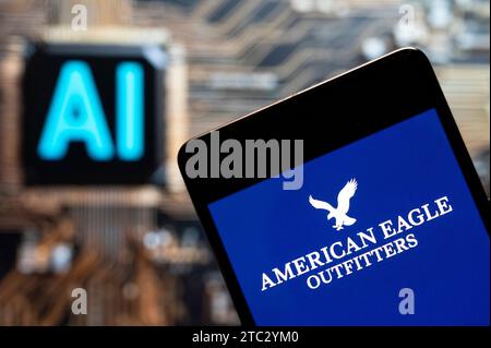 In this photo illustration, the merican clothing and accessories retailer American Eagle logo seen displayed on a smartphone with an Artificial intelligence (AI) chip and symbol in the background. Stock Photo