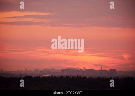 The clouds during the golden hour of the morning were illuminated by the soft sunlight, creating a peaceful and calming scene. Stock Photo