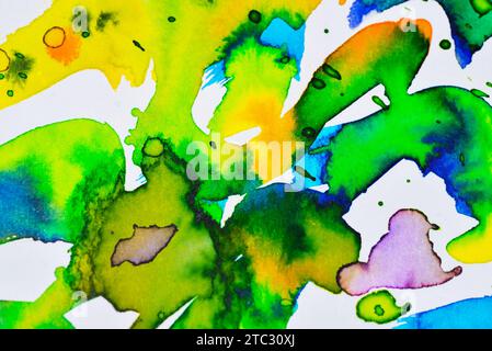 Abstract watercolor background, spots in blue, green and yellow color on white background. Stock Photo