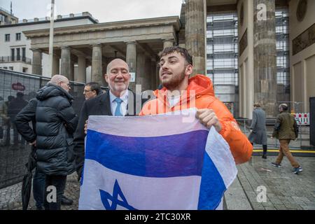 Berlin, Germany. 10th Dec, 2023. At the solidarity protest in Berlin, a moment was captured featuring Ron Prosor, a distinguished Israeli diplomat, writer, and columnist. Prosor, recognized for his extensive diplomatic career and contributions to international relations, currently serves as the Head of the Abba Eban Institute for International Diplomacy at the IDC Herzliya Lauder School of Government, Diplomacy & Strategy. His appointment as Israel's Ambassador to Germany on December 29, 2021, marked a significant milestone in his career, underscoring his expertise and commitment to fosteri Stock Photo