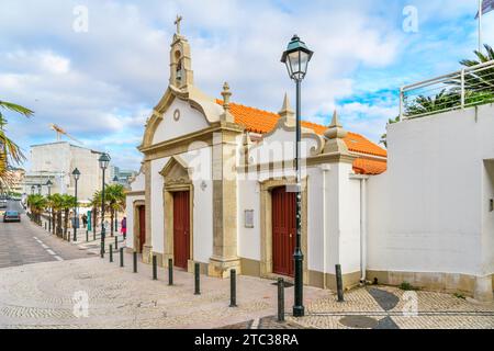 The small Orthodox Ermida de Nossa Senhora da Conceição dos Inocentes Church in the seaside town of Cascais, Portugal. Stock Photo
