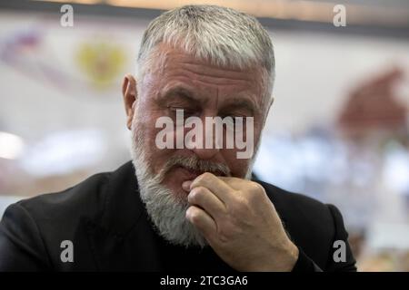 Moscow, Russia. 10th of December, 2023. Lawmaker Adam Delimkhanov attends the opening of Chechen Republic Day during the Russia Expo international exhibition and forum at the VDNKh exhibition centre in Moscow, Russia. Credit: Nikolay Vinokurov/Alamy Live News Stock Photo