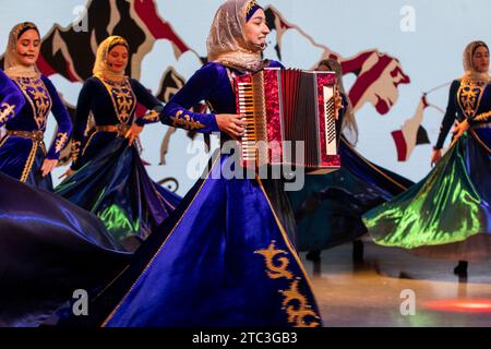 Moscow, Russia. 10th of December, 2023. Performers at the opening of Chechen Republic Day during the Russia Expo international exhibition and forum at the VDNKh exhibition centre in Moscow, Russia. Credit: Nikolay Vinokurov/Alamy Live News Stock Photo