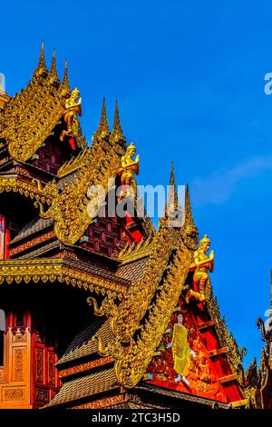 Traditional Thai Style Animal Gods Carved on Roof Decorations Against a ...