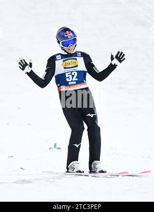 Ryoyu Kobayashi, of Japan, reacts after his second round jump of the ...