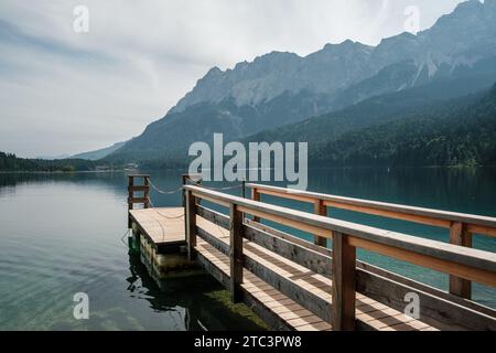 View from the shore of Lake Eibsee in Germany, with the mountain Zugspitze in the background. Stock Photo