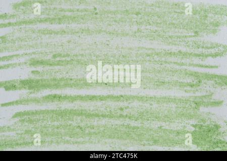 Background is white sheet painted over with green pencil Stock Photo