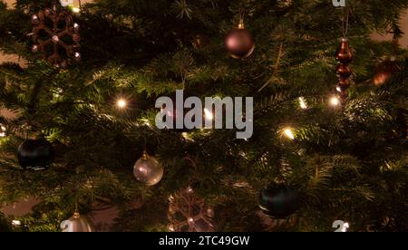 Christmas tree with decorations and lights Stock Photo