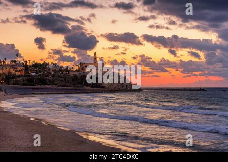 Old town of Jaffa over the sand beach bay on sunset, Tel Aviv, Israel. Stock Photo