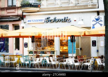 Cologne, Germany November 22 2023: empty tables and chairs in front of the famous restaurant schmitz on aachener strasse in cologne Stock Photo
