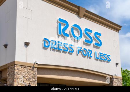 Close up of the Rose Dress for Less sign on the building is seen. Salt Lake City, Utah, USA - May 15, 2023. Stock Photo