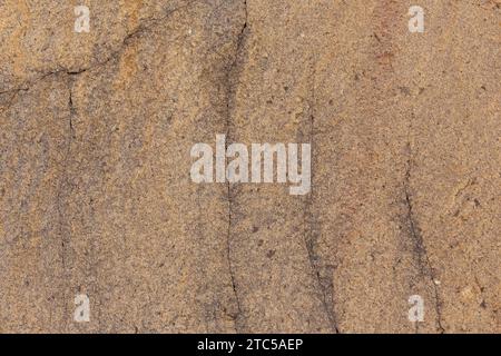 Sand stone texture detail, closeup shot of the rock surface. Background idea Stock Photo